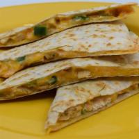 Chicken Bacon Ranch Quesadilla · Juicy chicken, jack and cheddar cheeses, applewood smoked bacon and a ranch drizzle.