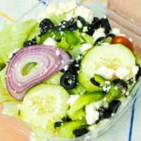 Greek Salad · Mixed greens, feta cheese, tomatoes, cucumbers and olives.