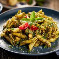 Penne Pesto · Creamy basil pesto sauce tossed with al dente penne pasta and topped with a sprinkle of parm...