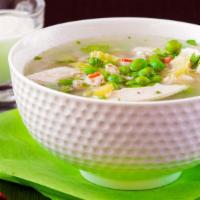 Homemade Chicken Soup · Homemade, rich chicken soup with aromatic spices and tender vegetables and chunks of fall ap...