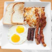 American Breakfast · Your choice of toast, 2 bacons or 2 sausages, 2 eggs your style ,hash brown,butter and jam.
