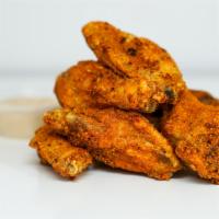  6 Classic Bone-In Wings  · 6 Classic bone-in chicken wings tossed with wing sauce and served with your choice of dippin...