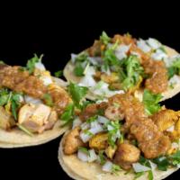 Choice Of 3 Tacos · Choice of meat of carne asada, al pastor, chicken or shrimp for an additional $2. Topped wit...