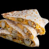 Quesadilla · Enjoy a 13 inch tortilla with melted cheese topped with lettuce, sour cream and guacamole. Y...