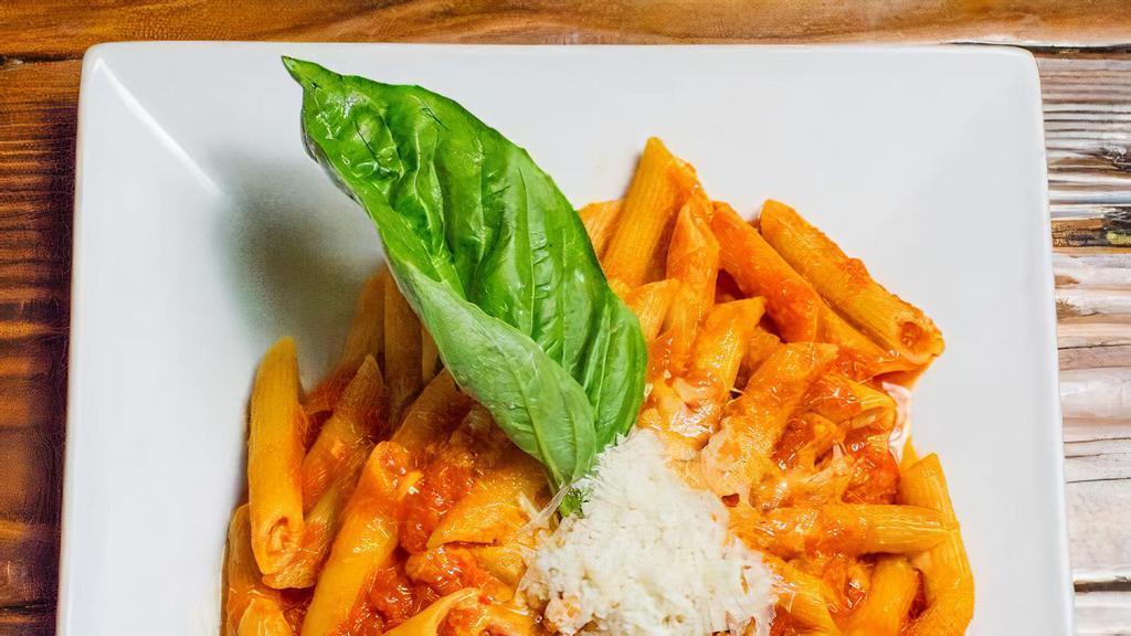 Classic Tomato Sauce · Classic red sauce made with tomatoes, basil, garlic and olive oil. Served over penne pasta.