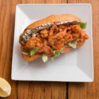 Lobster Po Boy · Deep fried chunks of Butter Poached lobster meat, Tartar sauce, lettuce, tomato.
