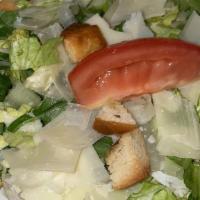 Caesar Salad · romaine salad tossed with our caesar dressing,  garlic croutons & parmesan cheese