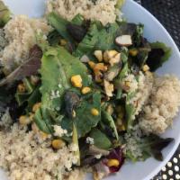 Insalata Quinoa · mixed greens, quinoa, charred roasted corn, toasted almonds & balsamic vinaigrette