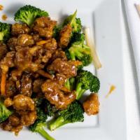 Orange Chicken · Crispy chicken with sweet and spicy orange sauce with vegetables. White rice/ fried rice.