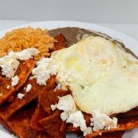 Chilaquiles · Deep fried corn tortillas, your choice of red or green sauce served with 2 eggs, rice, refri...
