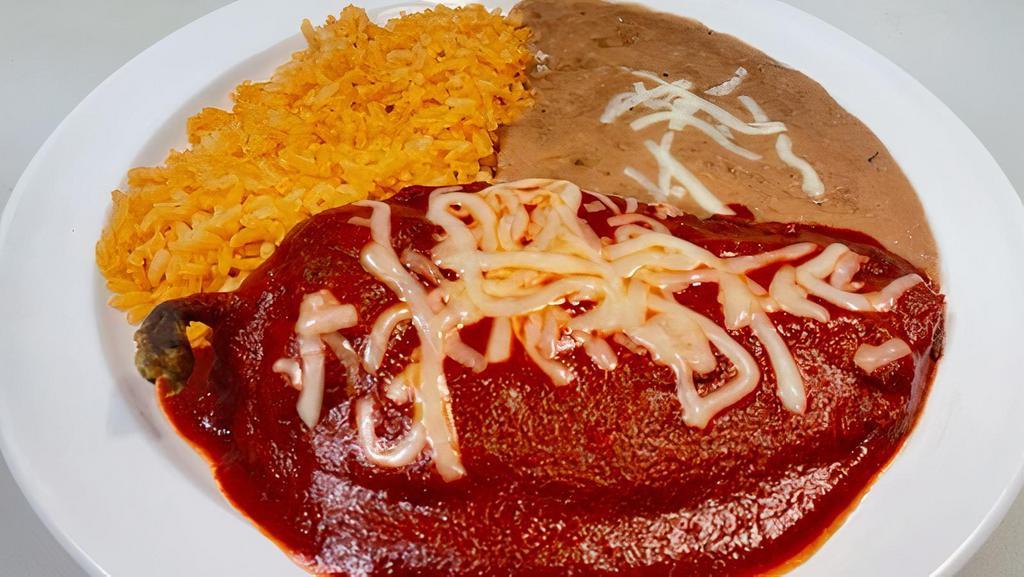 Chile Relleno Plate · Vegetarian. 1 pasilla pepper stuffed with cheese and topped with red salsa, served with lettuce, sour cream, rice, refried beans and 4 tortillas.
