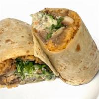 Super Burrito · Meat, rice, refried beans, cheese, lettuce, pico de gallo sour cream, guacamole and salsa