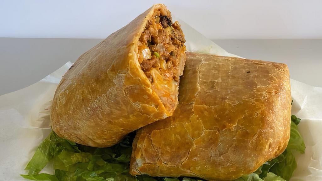 Chimichanga · Deep fried burrito with meat, rice refried beans, onion, cilantro and salsa