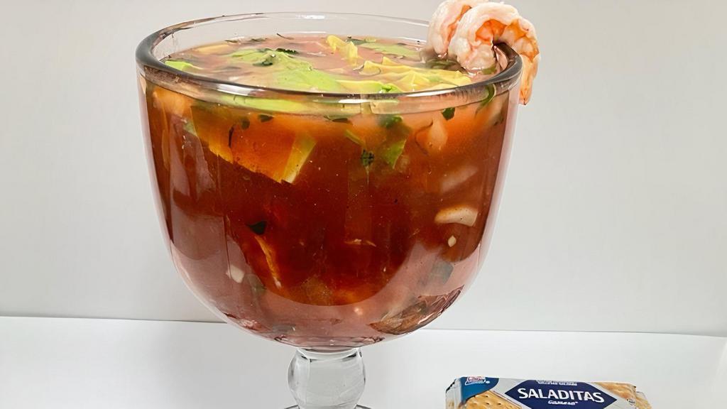 Shrimp Cocktail · Shrimp with tomatoes, onion, cilantro, avocado, jalapeño, shrimp juice and  special sauce with a hint of lime served with saltine crackers