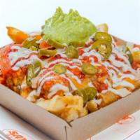 7 Layer Fries · french fries topped with nacho cheese, pinto beans, taco sauce, nacho cheese, guacamole, tof...