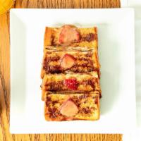 Horchata French Toast · Rompope reduction, cinnamon, strawberries, brioche bread