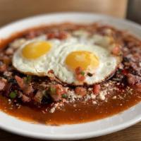 Huevos Rancheros · Organic tortillas, beans, pico de gallo, fried egg, cotija.