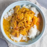 Yellow Curry (Kai Curry) · Chicken breast with potatoes, carrots, and onions in yellow curry.