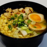 Chicken · Chicken noodle soup with chicken, corn, cabbage, egg.