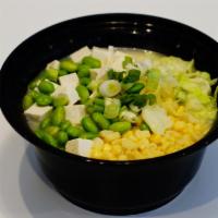Vegetarian · Vegetarian noodle soup with cabbage, edmame, tofu and corn.