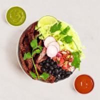 Carne Asada Burrito Bowl · Carne asada with Mexican rice, black beans, pico de gallo, and lettuce.