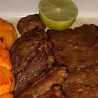Spot King'S Plate · Shish kabob, barg (filet mignon), beef kudbideh and filet of chicken. Comes with basmati ric...