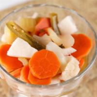 Escabeche (Pickled Vegetables) · Pickled carrots, celery, cauliflower, jícama & jalapenos.
