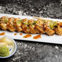 Cougar Roll · Tempura shrimp, spicy crab, avocado, cucumber and cream cheese deep fried with teriyaki and ...