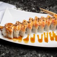 Tigger Roll · Crispy shrimp tempura and cucumber topped with spicy crab and teriyaki sauce.