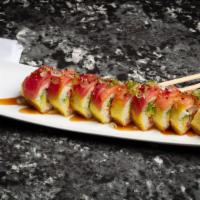 Iron Man Roll · Tempura shrimp and crab with avocado rolled in soy paper topped with tuna and smoke salmon d...