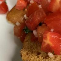 Bruschetta · Fresh tomatoes, olive oil, garlic, fresh basil on toasted garlic bread.