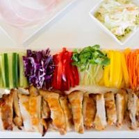Boneless Ssam Chicken · Roast oven chicken with assorted vegetables to wrap in thinly sliced radishes served with tw...