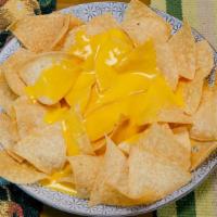 Nachos With Cheese · Crispy homemade chips with Nacho chese