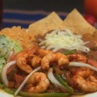 Shrimp Fajitas · Shrimp and grilled veggies with rice, beans, guacamole, cheese, salad,tomato, pico de gallo,...