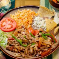 Chicken Fajitas · Chicket and grilled veggies with rice, beans, guacamole, cheese, salad,tomato, pico de gallo...