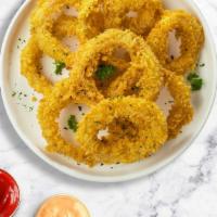 Onion Rings · (Vegetarian) Sliced onions dipped in a light batter and fried until crispy and golden brown.