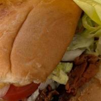 Torta Clasica · comes with mayo, beans, cheese,  lettuce, tomato, jalapeno and avocado
