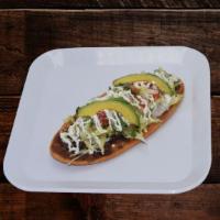 Huarache · comes with beans ,lettuce, pico de gallo, cotija cheese, sour cream and avocado.