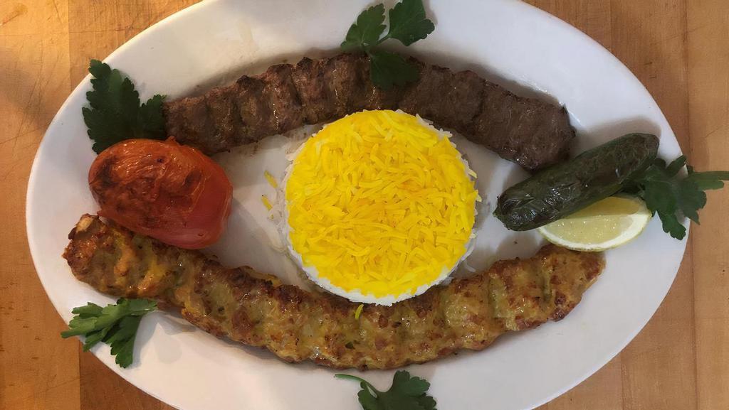 Combo Koobideh Kabob · Barbecued ground beef and chicken served with basmati rice, BBQ tomato and pepper. (One skewer of each).