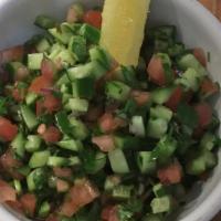 Salad-E-Shirazi · Freshly chopped cucumbers, tomatoes, onions,marinated in lime juice.