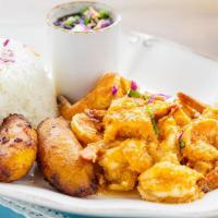 Camarones In Creole Sauce · Sauteed shrimp in garlic, onions, bell pepper, wine and tomatoes. Served with white rice, be...