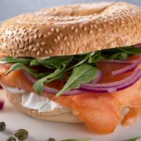Lox Bagel · Toasted bagel of your choice with cream cheese, smoked salmon, red onions, fresh arugula, an...