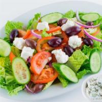 Greek Salad · Blend of romaine lettuce, Roma tomatoes, Persian cucumbers, red onions, Feta cheese, kalamat...
