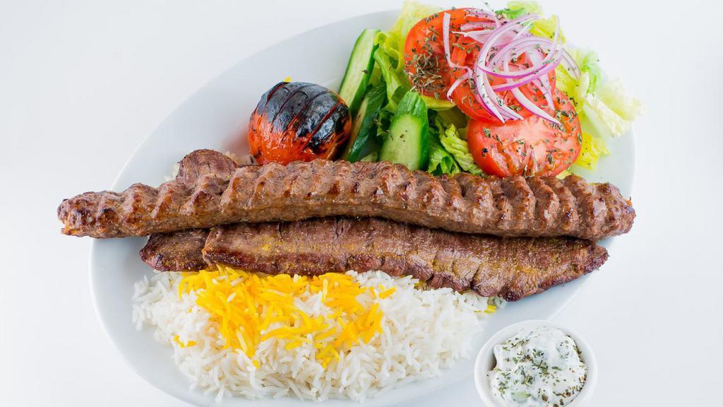 Soltani (Barg & Koobideh) · Combination of one charbroiled, filet mignon kabob and one seasoned ground beef sirloin kabob. Served with imported basmati rice, grilled tomato, and fresh garden salad.