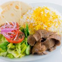 Gyros Plate · Mix of lamb and beef gyros with pita bread, served with basmati rice and fresh garden salad,...