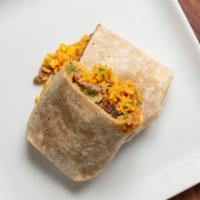 The Classic Burrito · Choice of meat. Served with refried beans, rice, onions, cilantro inside.