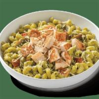 Pesto Cavatappi With Grilled Chicken · Curly pasta in basil pesto cream sauce, garlic, grilled chicken, mushrooms, tomato and parme...