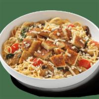 Alfredo Montamore® With Parmesan-Crusted Chicken · Spaghetti noodles in four-cheese blend alfredo, roasted mushrooms, tomato, spinach and parme...