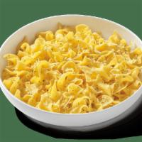 Buttered Noodles · Tender wavy egg noodles and butter topped with  Italian seasonings and parmesan. Try with ov...