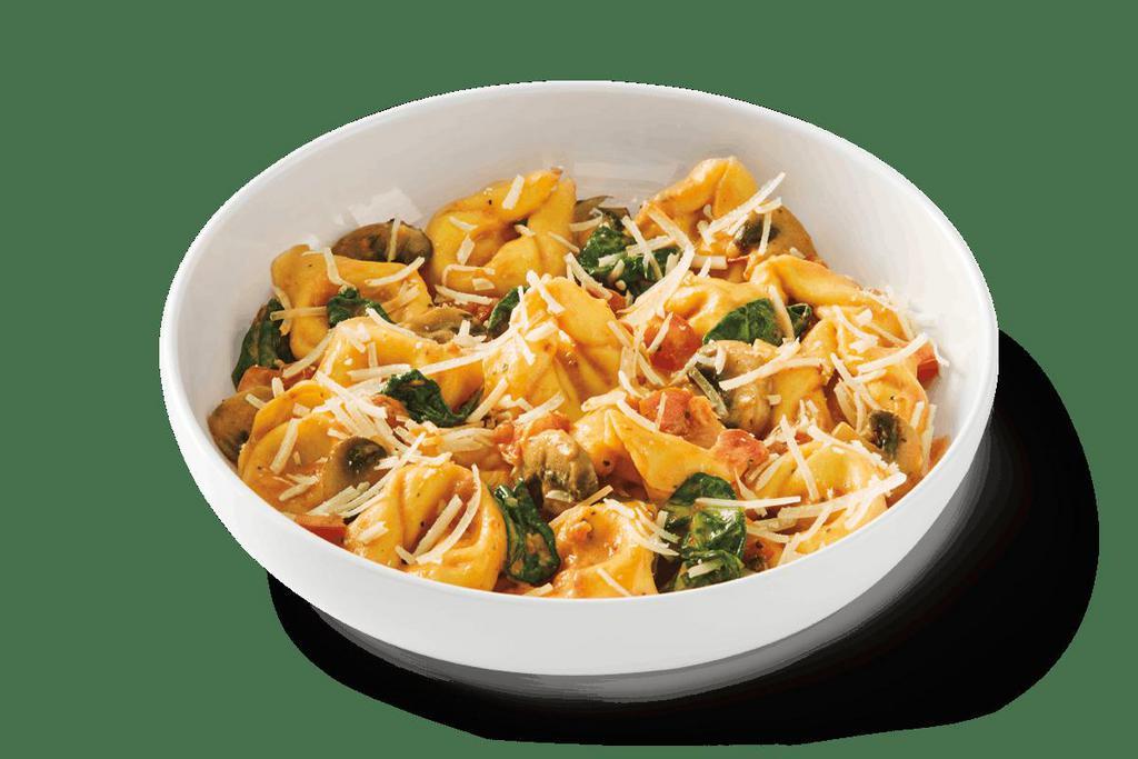 3-Cheese Tortelloni Rosa · Tortelloni filled with a blend of ricotta, mozzarella, parmesan, onions and garlic in spicy tomato cream sauce with mushrooms, Roma tomato, spinach and parmesan.. S | V .